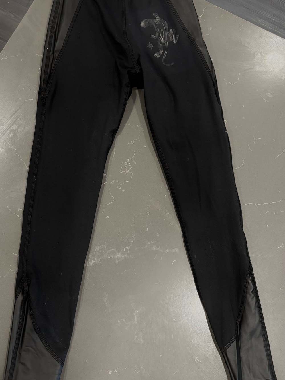 DUNDAS Black Garment with Gold Logo Tag